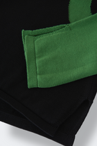 TOP ANDY en maille de cotton pima bicolore avec motif circulaire | NOIR VERT